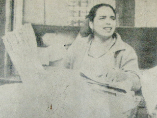Mujer vendiendo "pan de Lota", Revista Sindical Chilena.